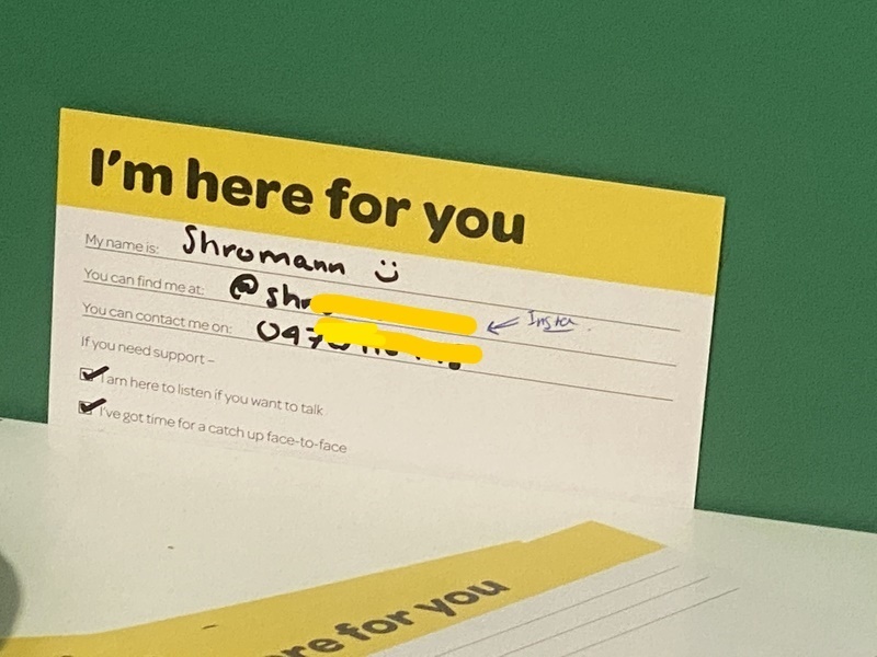 A picture of a card someone filled out in order to volunteer their time to talk to someone who might be having a hard time. 