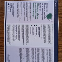 A pamphlet in French detailing mandatory masking procedures. 