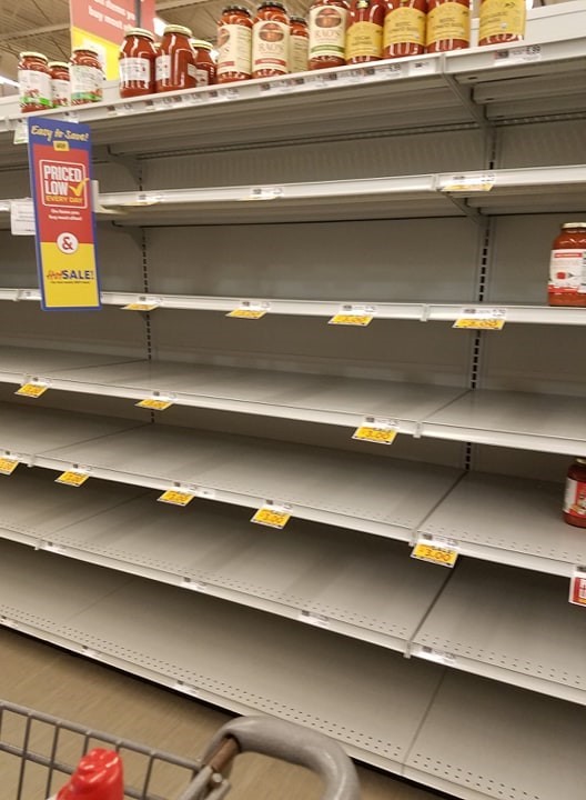 Empty shelves at a grocery store. 