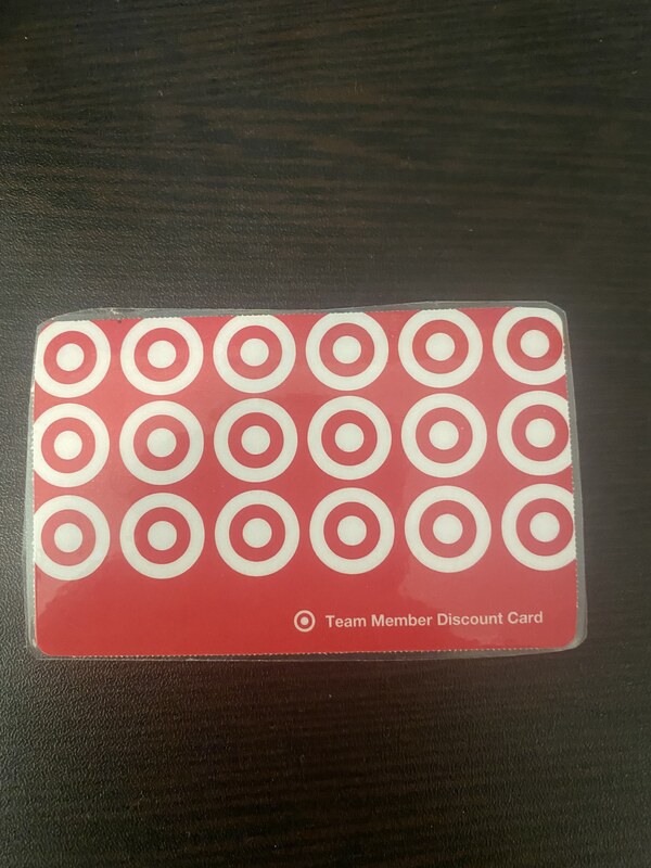 Target Team Member Discount Card on wooden table.