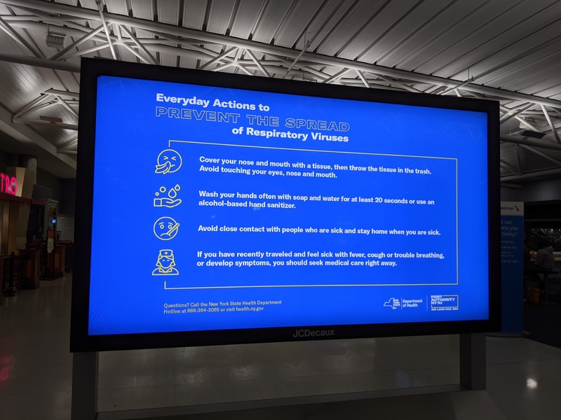 An infographic from the New York State Department Health sign in the John F. Kennedy airport that talks about how to prevent spreading respiratory viruses. 