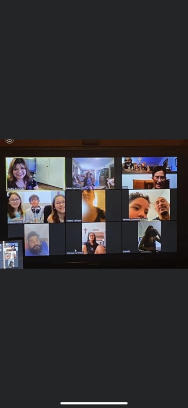 A zoom meeting with multiple people.