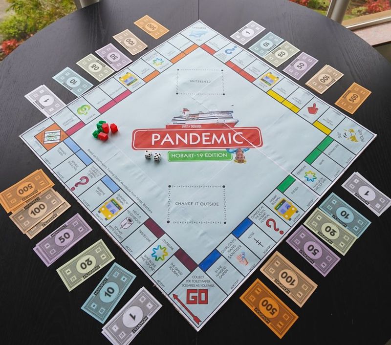 A monopoly board game centered around the pandemic. 