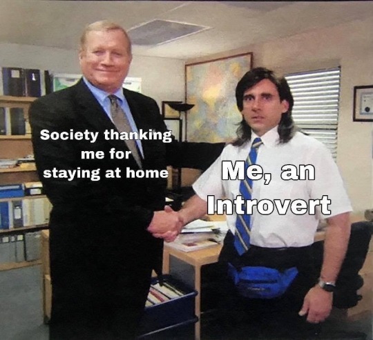 Meme from television series "The Office" depicting two men shaking hands.  Text under man on left reads "Society thanking me for staying at home".  Text under man on right reads "Me, an introvert". 