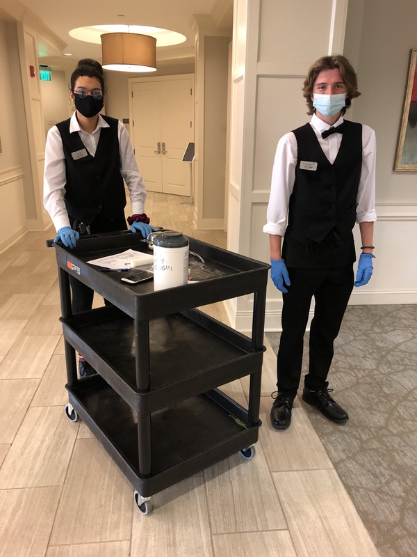 Room service with masks and gloves.