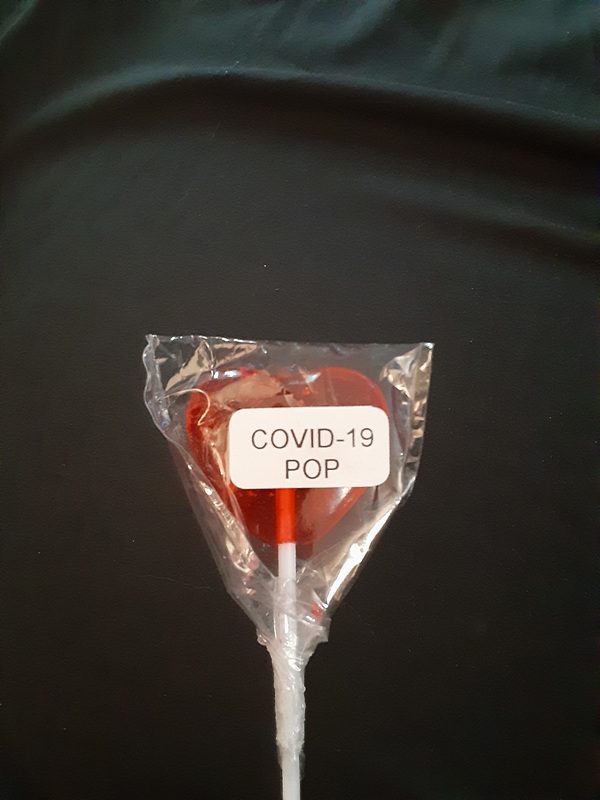 A heart shaped lollipop.
