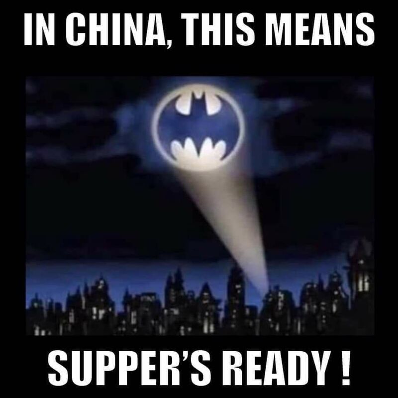 This is a picture of a racist batman themed meme, which shows an image of the bat signal being projected into the air with the words "In China, this means supper's ready!" above and below the picture. 