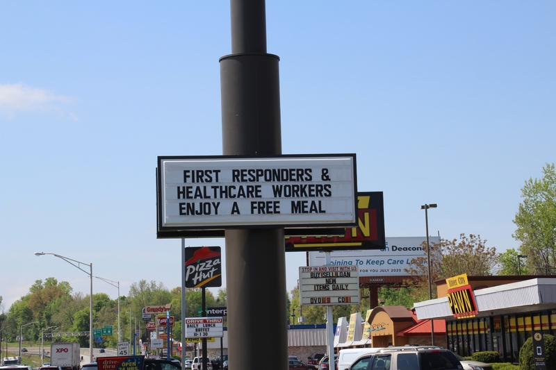 A  Sign reading "First Responders and Healthcare Workers Enjoy a Free Meal".