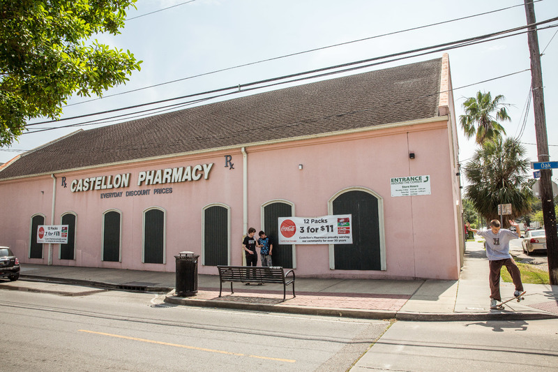Skateboarders in front of Castellon Pharmacy in New Orleans. 