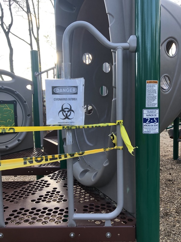 Warning tape around a playground. 