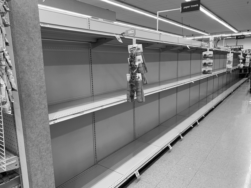 Empty shelves in a grocery store. 