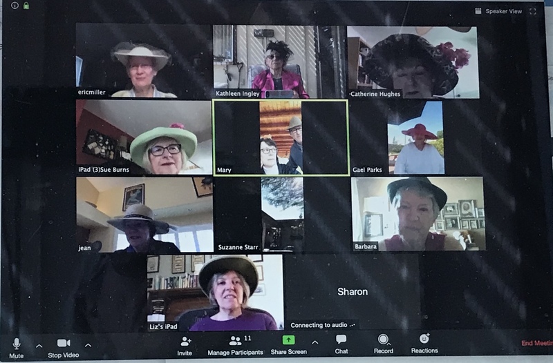 This is a picture of a computer monitor which shows a group of people engaged in a zoom call. 