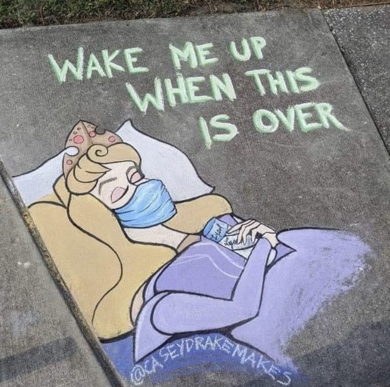 Sidewalk art of Sleeping Beauty sleeping with a mask on and text that says "wake me up when this is over."