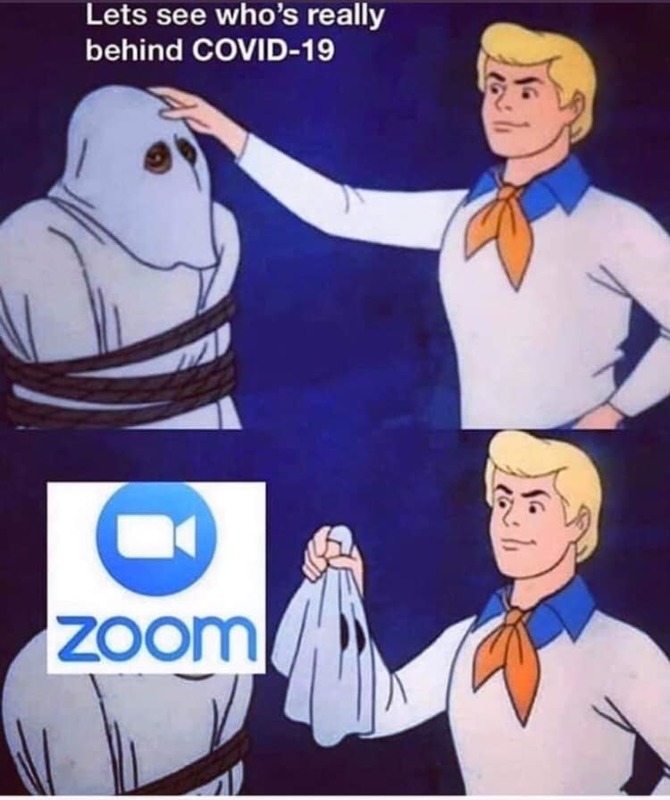 A meme from Scooby Doo. In the first frame is Freddie who is asking: Lets see who's really behind COVID-19 and Freddie's hand is about to take the mask off of a person who is tied up and looks like a ghost. In the second frame, Freddie has the mask in his hand and over the person's face is the logo for Zoom. 