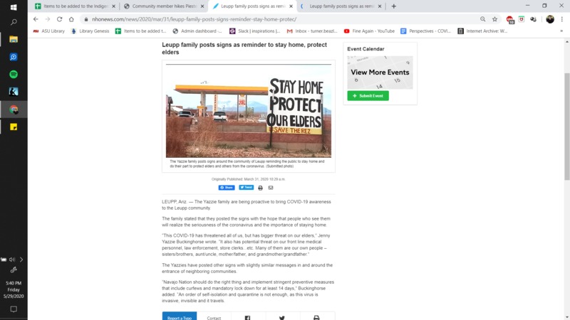 News article about a sign posted in Navajo Nation that says "stay home protect our elders".