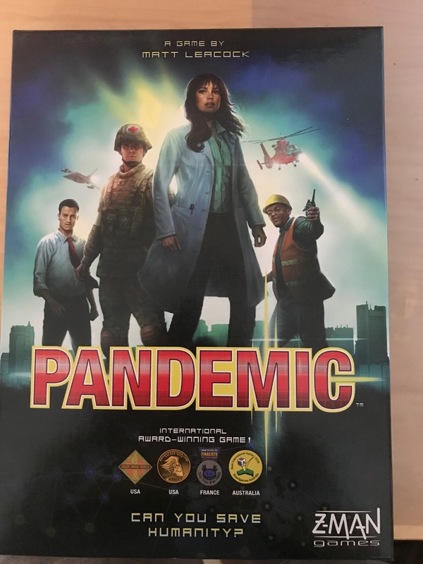 Picture of a board game called "Pandemic" with multiple people on the cover. 