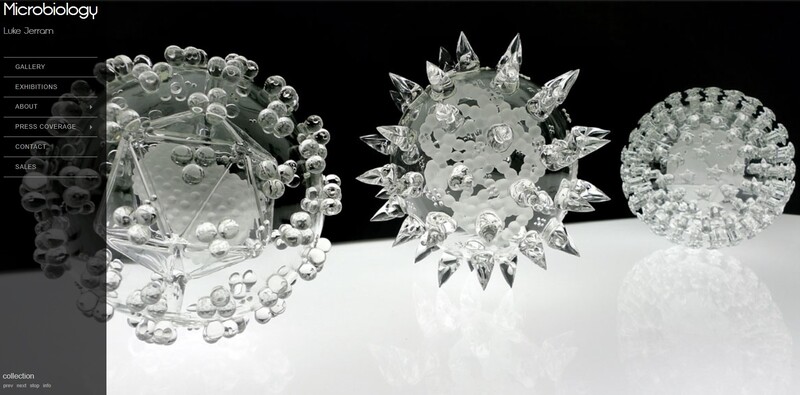 Glass microbiology exhibit  image, with three virus shapes sculpted out of glass. 