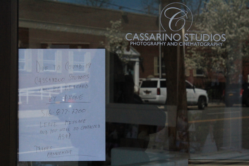 Hand written note informing people that Cassarino Studios: Photography & Cinematography is closed. 