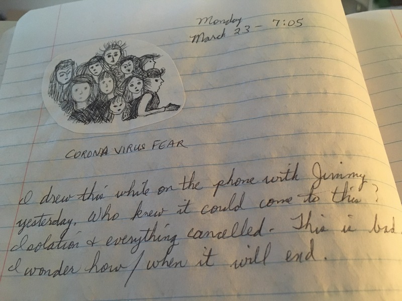 A journal entry in a notebook reflecting about the coronavirus. 