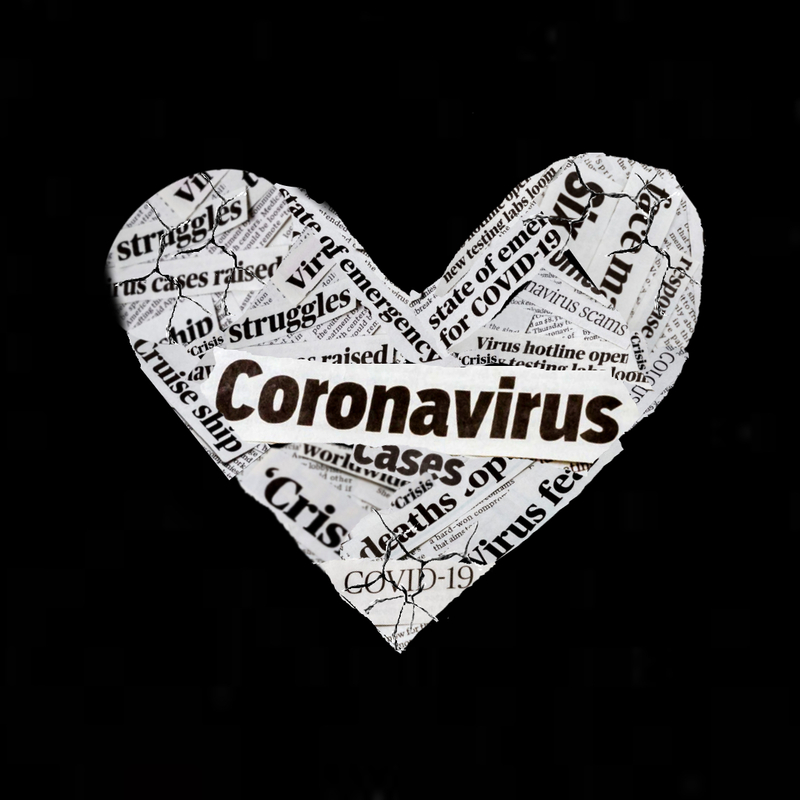 This is an image of a heart made out of folded newspaper, which happens to be covered in headlines related to COVID-19. 