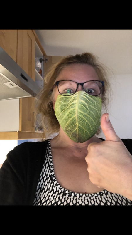 A face mask that looks like a cabbage leaf. 