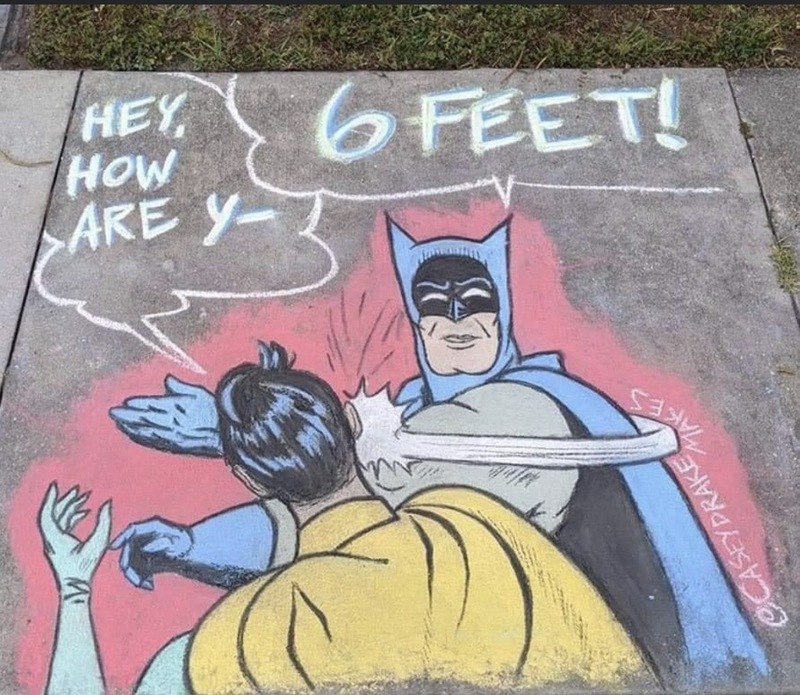 Sidewalk art of Batman slapping Robin and telling him to stay 6 feet back.
