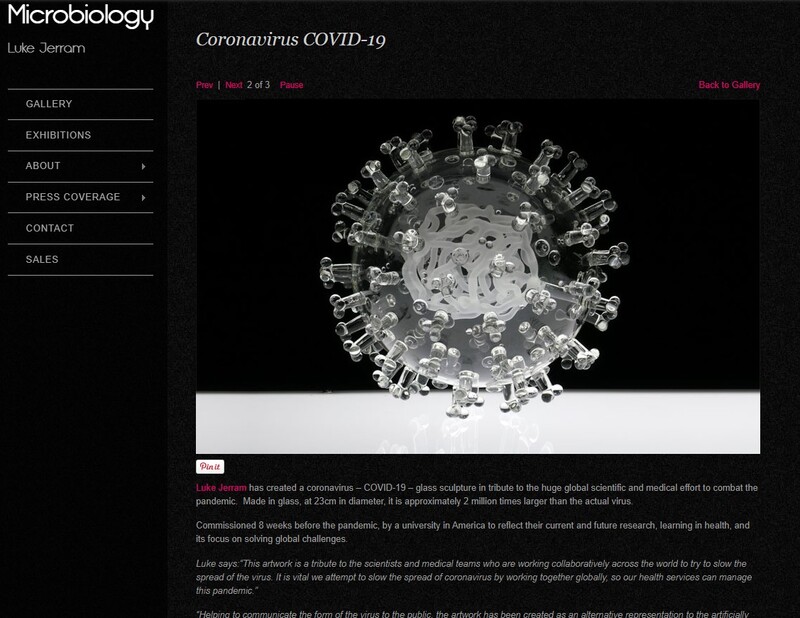 Virus shape sculpted out of glass.