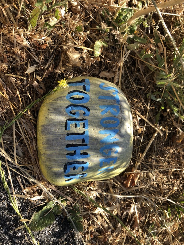 This is a picture of a rock painted yellow.