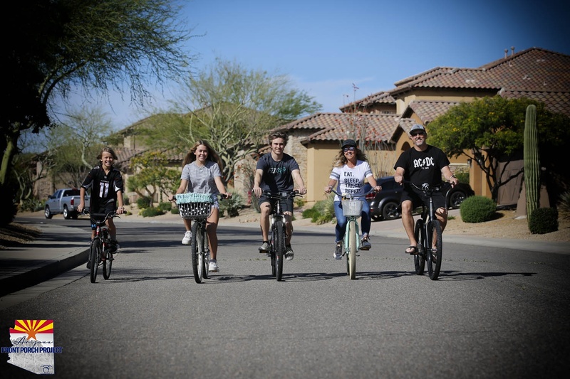 five people riding bikes. 