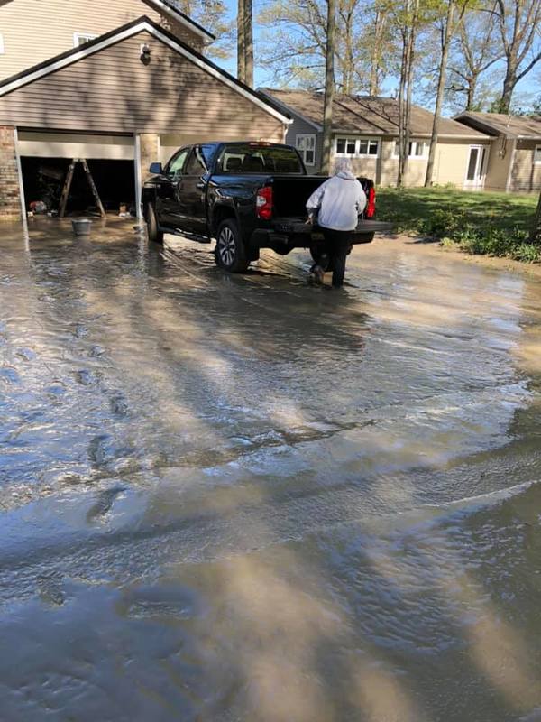 Image of a flooded driveway.