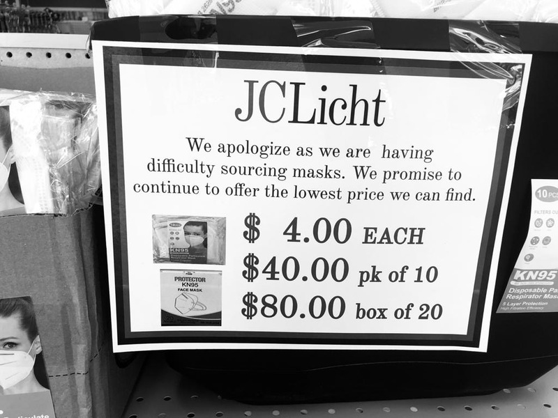 Image of a sign in a grocery store which reads we apologize as we are having difficulty sourcing masks. We promise to continue to offer the lowest price we can find. $4.00 each, $40.00 pack of 10, $80.00 box of 20.