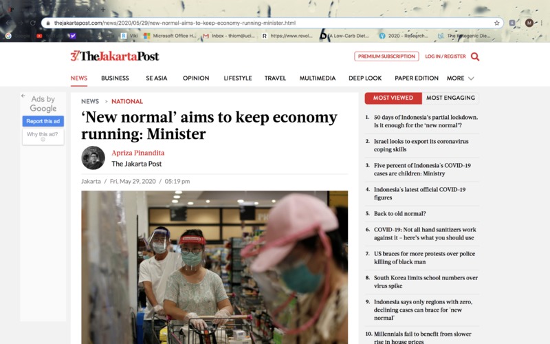 A news article with the headline "‘New normal’ aims to keep economy running: Minister", and a photo of people in a grocery store wearing masks and face-shields.