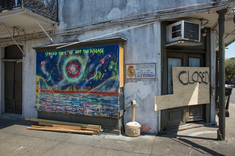 A mural next to a closed building.