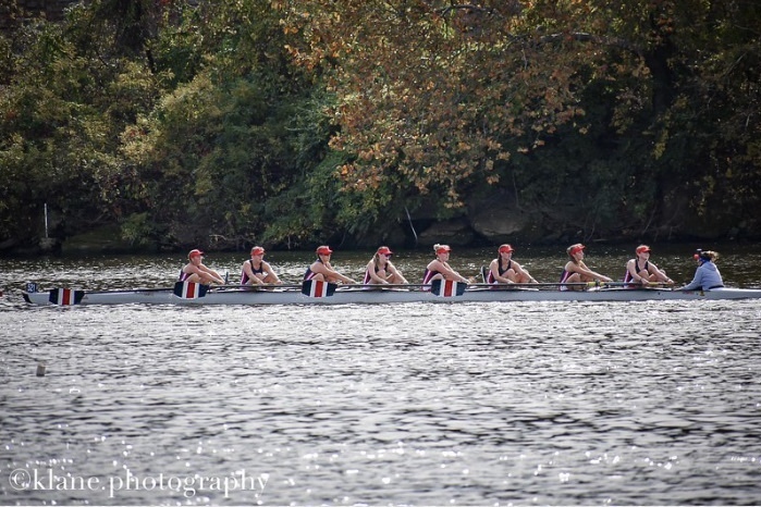 Rowing crew on the water.