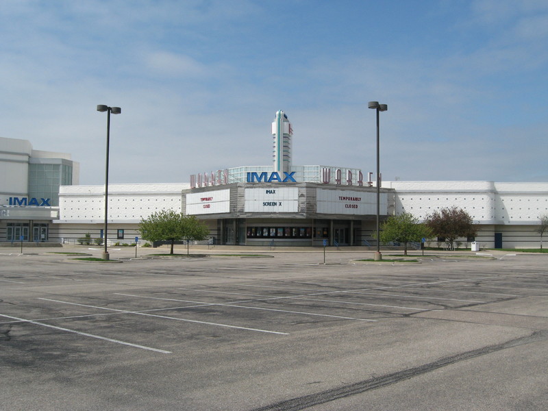 Image of an empty movie theater parking lot.