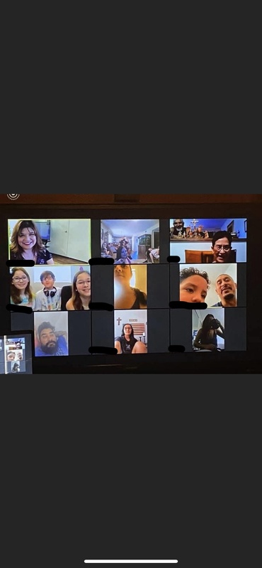 A zoom meeting with multiple people. 