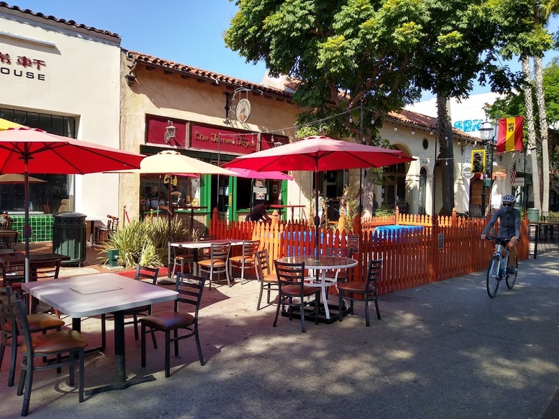 This is a picture taken of an outdoor seating area for a restaurant. 