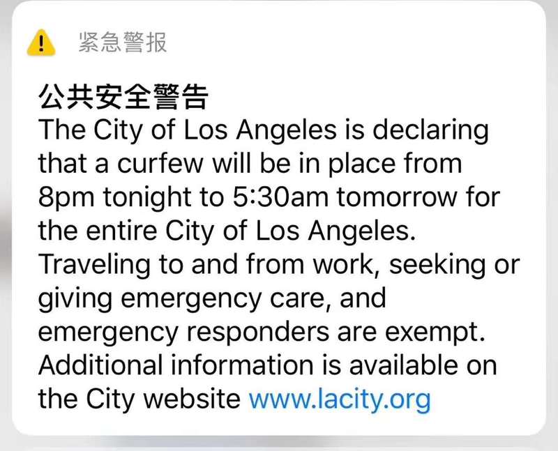 A screenshot of an alert announcing a curfew in Los Angeles from 8PM to 5:30AM