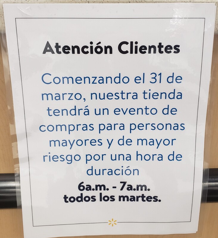 A sign in Spanish translating to "Attention Customers. Starting March 31st, our store will hold an hour-long shopping event for seniors and those most at risk from 6 AM to 7 AM every Tuesday".