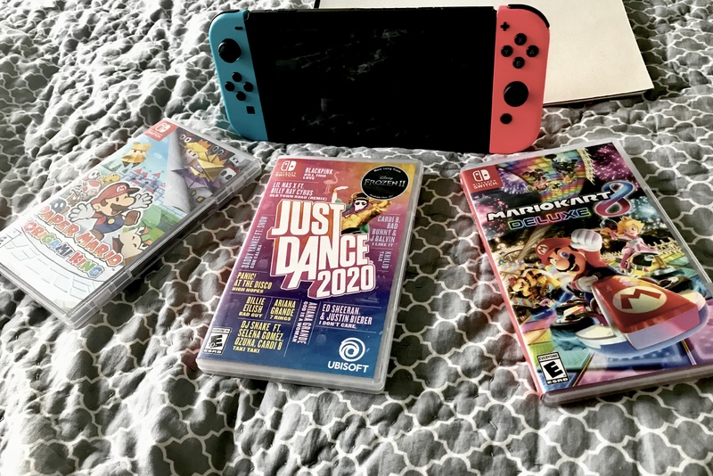 Three video games and a Nintendo Switch. 