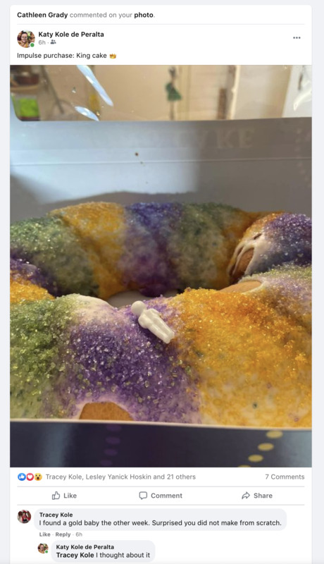 Screenshot of Facebook post. Image is of a king cake with miniature baby lying on top. Text reads, "Impulse purchase: let there be cake". 