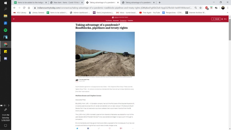 A screenshot of a news article discussing the governor of South Dakota's attempts to remove COVID-19 checkpoints that tribes have set up along a pipeline.