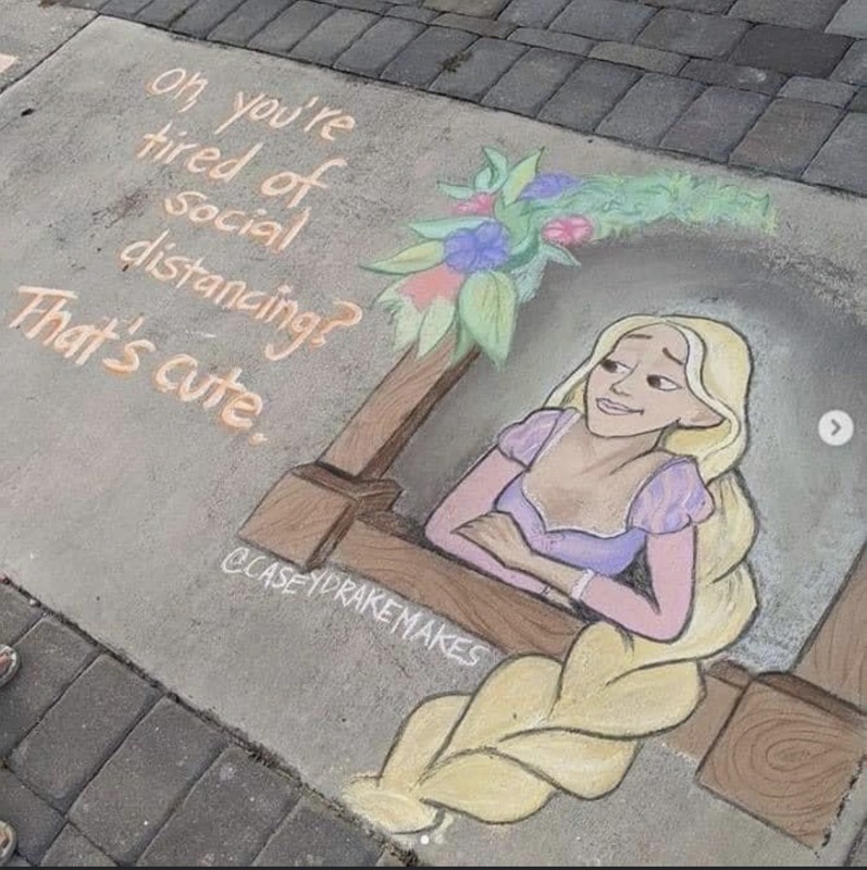 Sidewalk art of a character with long blonde hair that says "oh, you're tired of social distancing? That's cute."