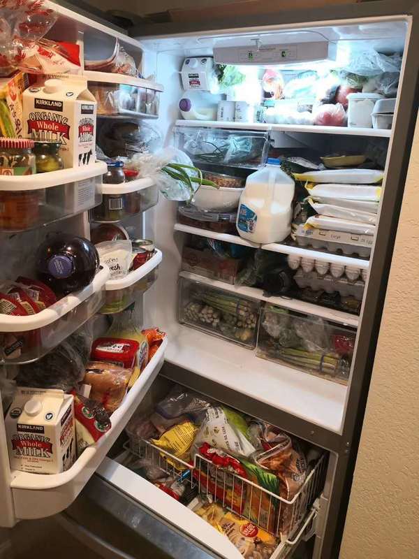 A fridge full of food. 