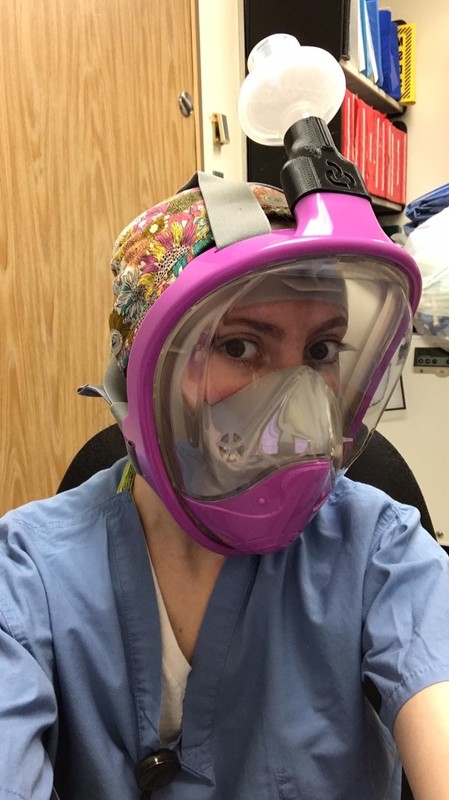 A healthcare worker wearing a makeshift mask.