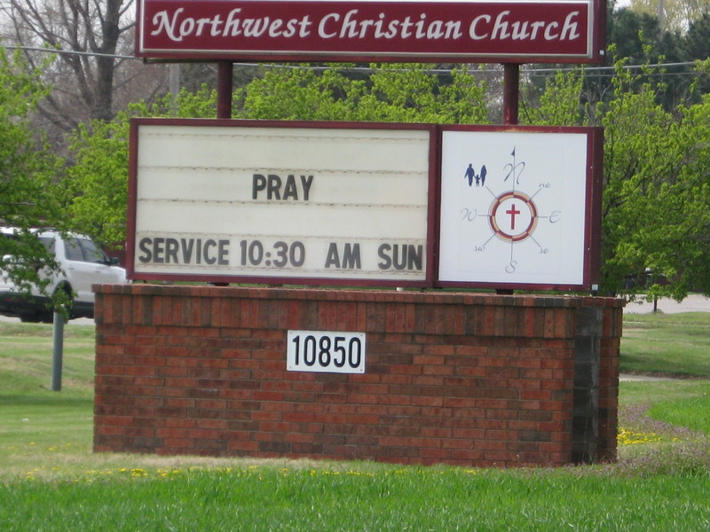 Image of a church billboard sign which reads pray, service 10:30 AM Sunday.