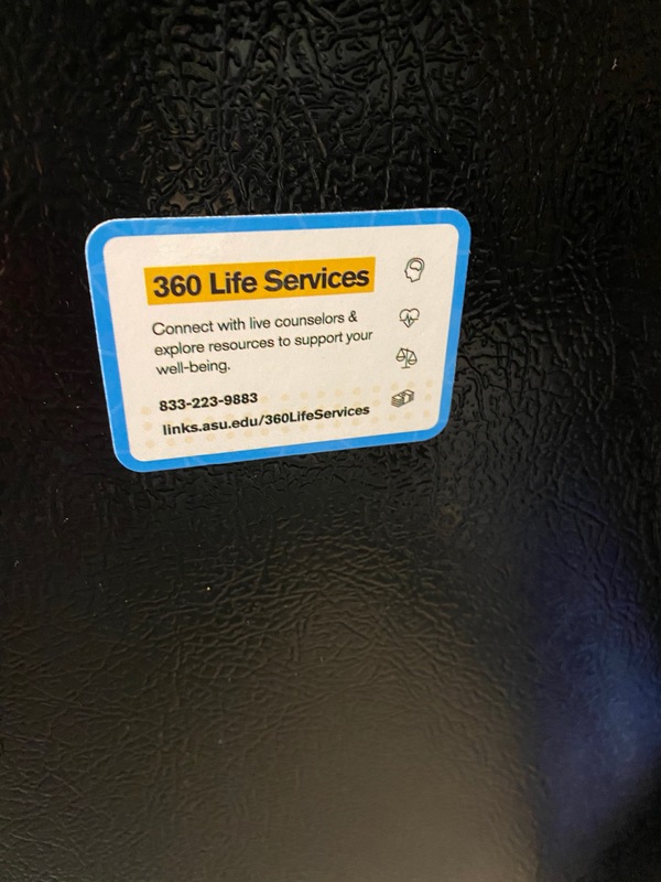 A sticker showing the various ways to contact mental health services at Arizona State University.