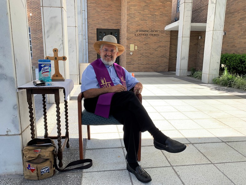 Image of a pastor set up outside for a church service.