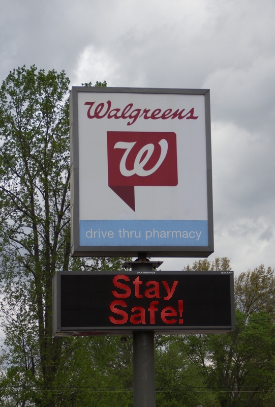 Photo of a sign outside a Walgreens reading "Stay Safe!"