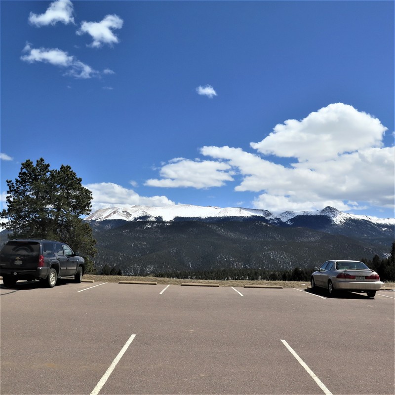 Vehicles parked several spaces away from each other at Mueller State Park Colorado.